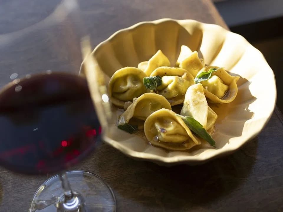 House-made cappelletti pasta — Le Charme seasonal menu, Calgary