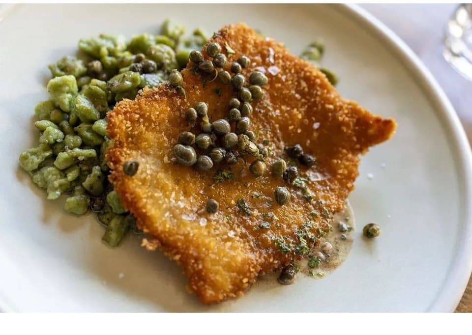 Le Charme French bistro plated dish — reserve your table for dinner on Edmonton Trail, Calgary